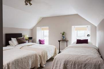 This room has 'zip and link' beds and a further single bed for flexibility.