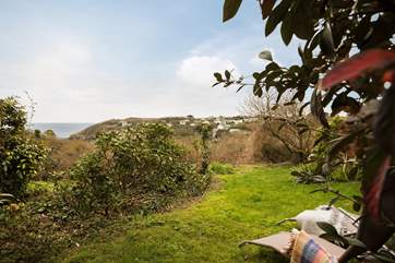 Relax on a sun lounger in the peaceful gardens.