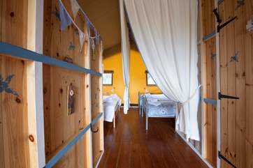 Looking through, past the kitchen, to the bedrooms.
