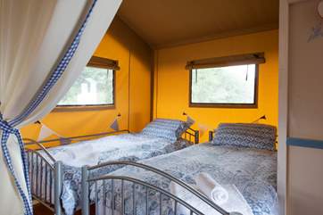 The cosy twin beds.