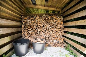 There are plenty of logs for the wood-fired range.