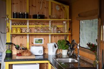 Celandine's kitchen-area complete with hot and cold water to the kitchen sink, an electric kettle, toaster and a fridge/freezer!