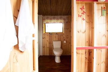 The spacious en suite shower-room with WC and wash-basin and double size shower.