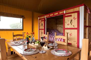 There is plenty of space for all around the dining table.