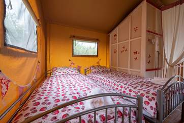 The cosy twin beds.