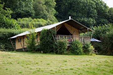 The large covered balcony is a great place to relax and enjoy the peace of the countryside.