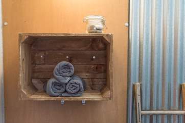 Your towels are rolled and ready in the walk in wet-room.