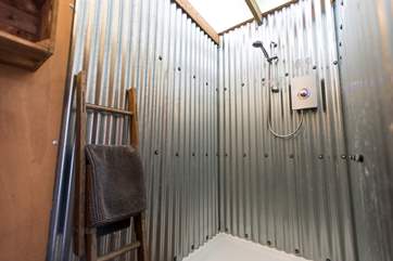 The fabulous wet-room with walk in hot double shower, an upcycled ladder for your towel rail and plenty of lovely soft towels.