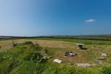 As well as the seven acre meadow, there is a further five acre meadow with fabulous sea views and the shared fire-pit for your use.