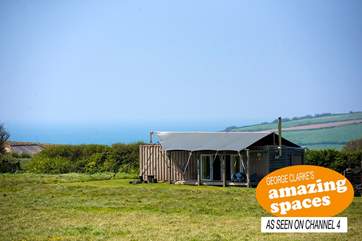 Barefoot Rusty - the terrific tin tent - is temptingly close to the sea.