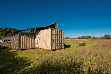 The en facilities are housed in a snug wood-clad extension to the back.