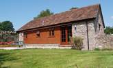 This lovely detached single-storey cottage is in a private location with level gardens and a sheltered patio. - Thumbnail Image