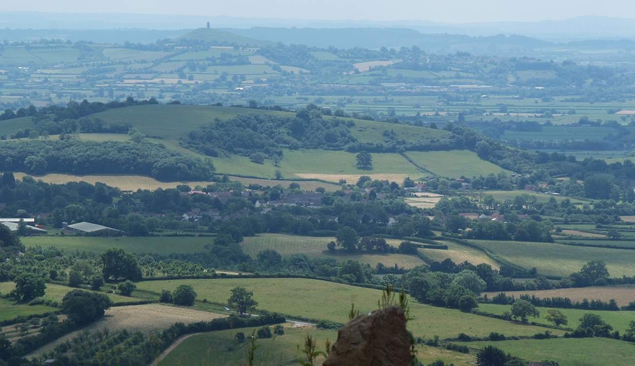 Somerset is a beautifully varied county. This view across the levels, with Glastonbury Tor in the distance, is taken from a vantage picnic point at the top of the Mendips.