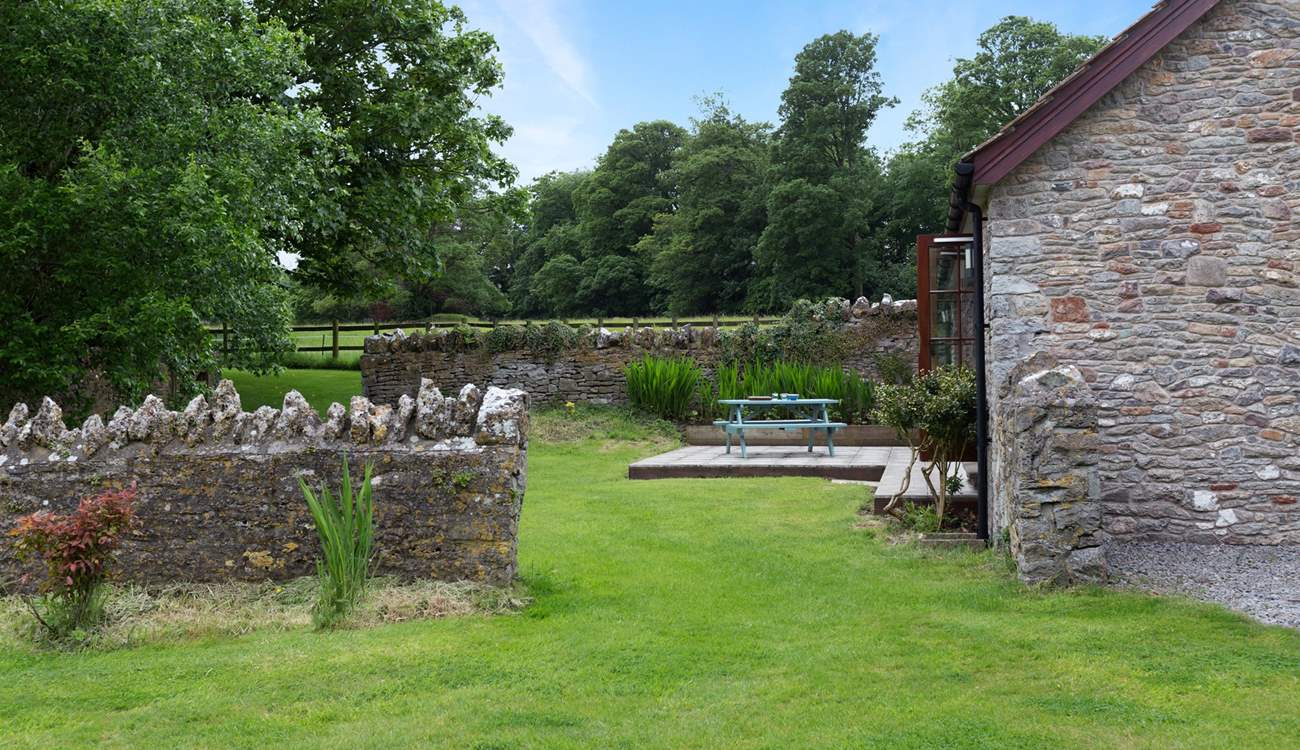 The garden is divided into two parts, all dedicated to the cottage and not overlooked by anyone else at all. The owner's house is some distance away.