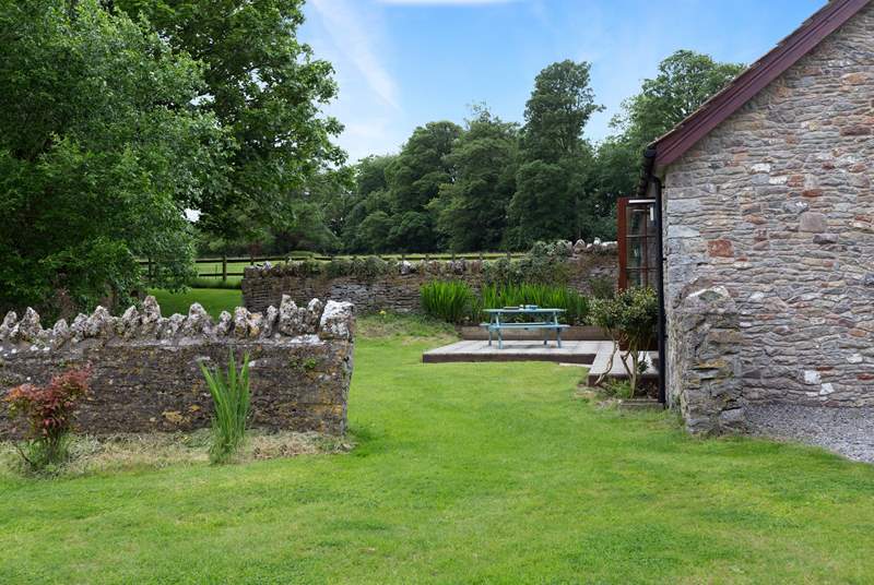 The garden is divided into two parts, all dedicated to the cottage and not overlooked by anyone else at all. The owner's house is some distance away.
