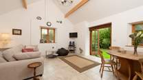 High ceilings and lots of windows make this room very spacious.