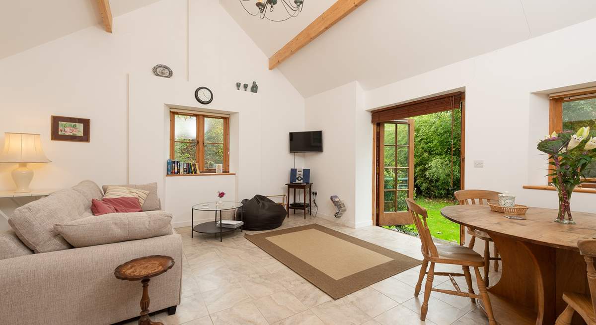 High ceilings and lots of windows make this room very spacious.