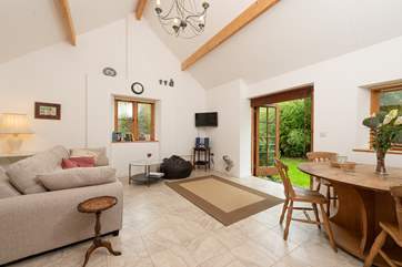 High ceilings and lots of windows make this room very spacious.
