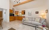 Ashey Barn has a spacious open plan living area, with the kitchen in one corner. - Thumbnail Image