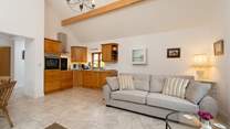 Ashey Barn has a spacious open plan living area, with the kitchen in one corner.