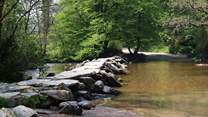 Visit the ancient Tarr Steps close to Dulverton. This historic clapper bridge is an iconic landmark in this beautiful National Park.