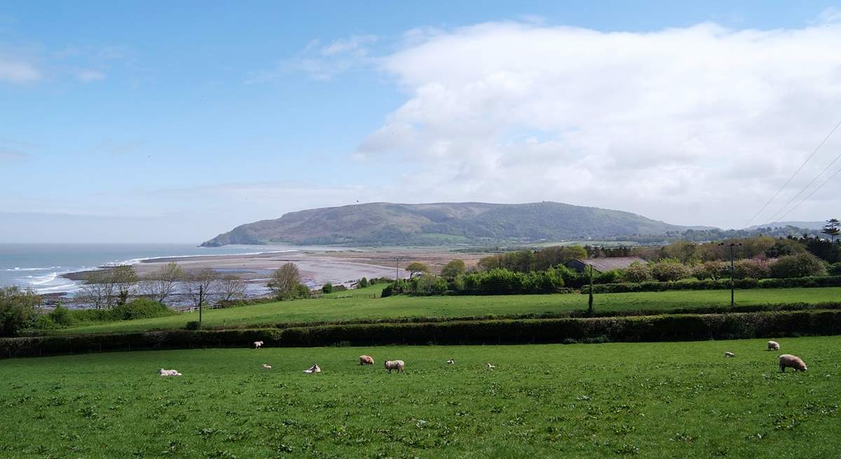 This is a view of Exmoor meeting the coast near Porlock.