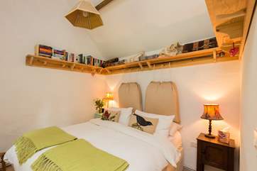 The bedroom is filled with warm touches to make you feel welcome and at home.