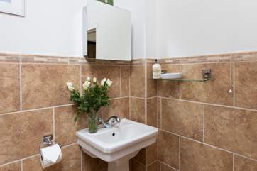The shower-room has a wet-room style walk-in shower.