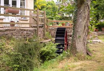 A little stream runs past the front of the cottage - complete with a water wheel.