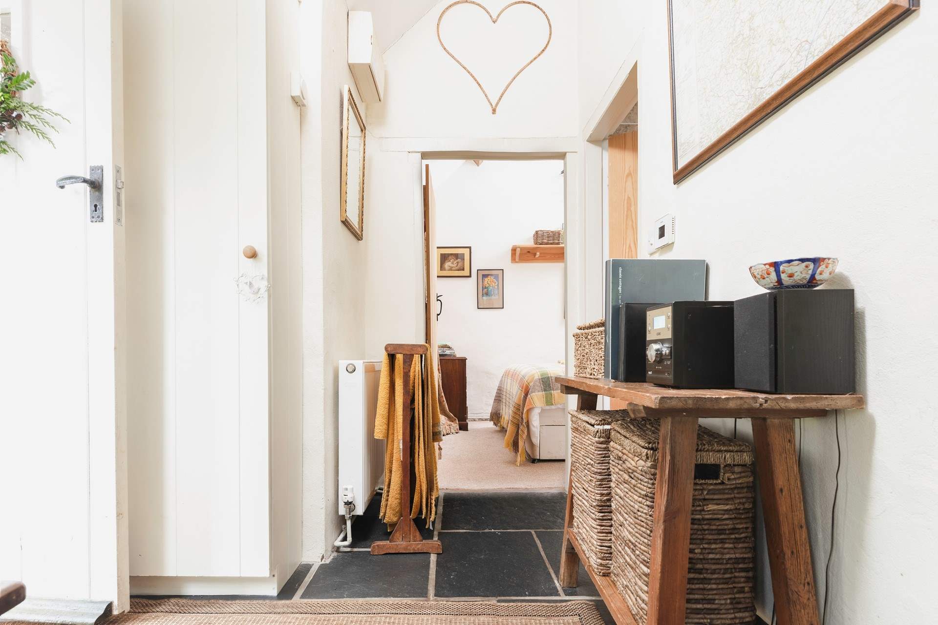 The lovely hall with some handy storage space for guests.