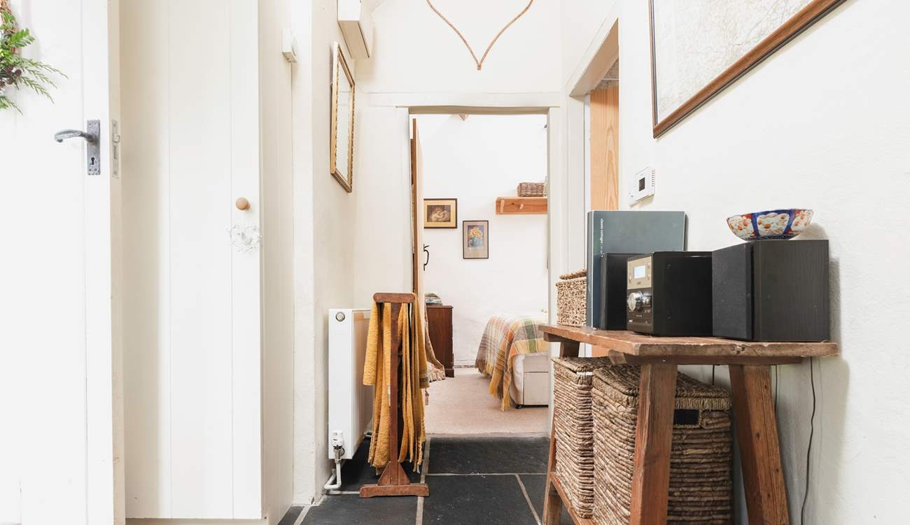 The lovely hall with some handy storage space for guests.