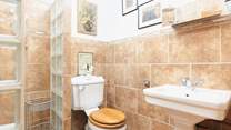 The shower-room has a wet-room style walk-in shower.