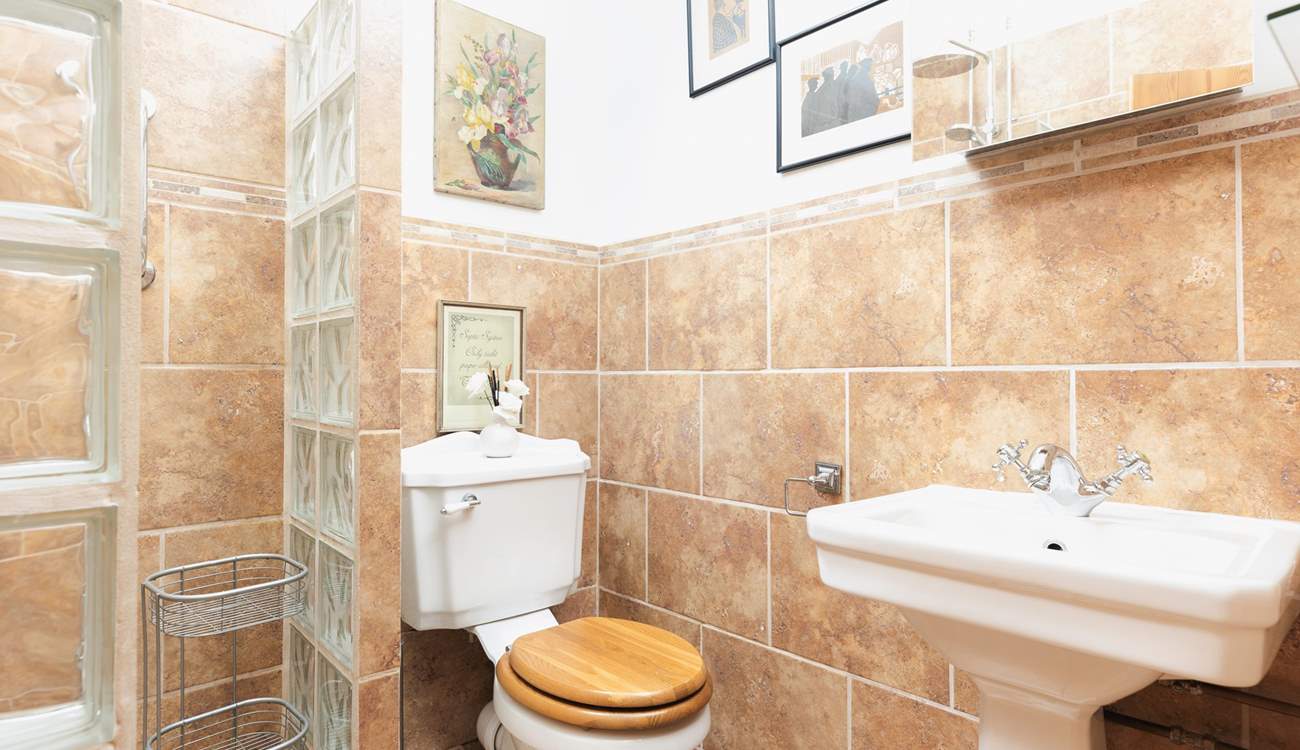 The shower-room has a wet-room style walk-in shower.