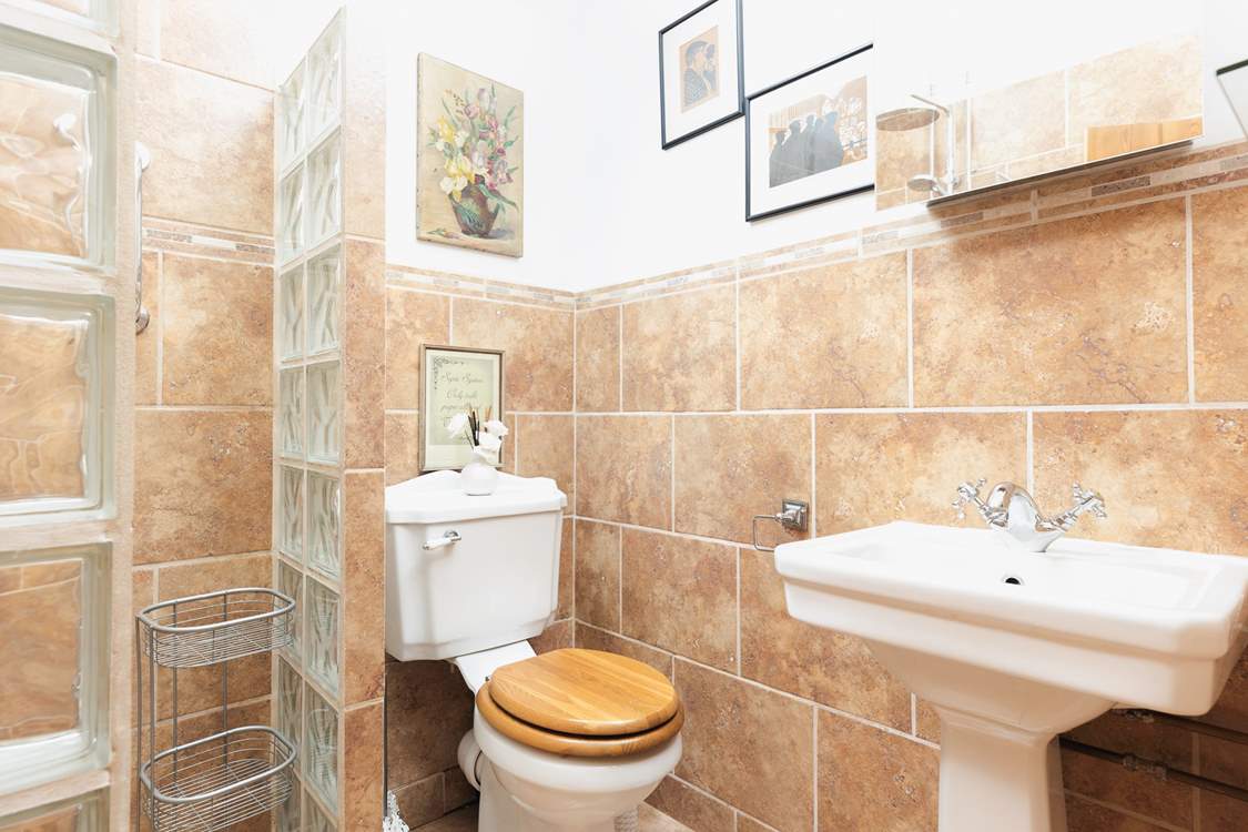 The shower-room has a wet-room style walk-in shower.