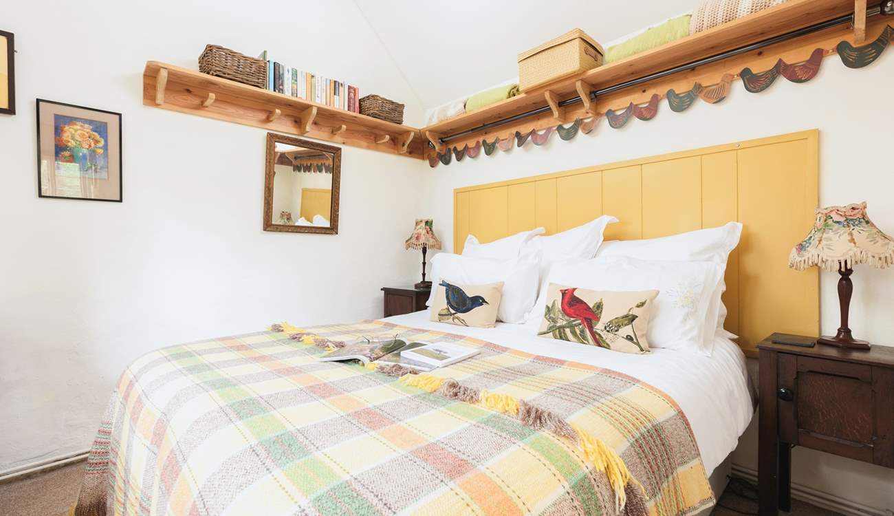 The bedroom is filled with warm touches to make you feel welcome and at home.