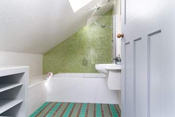 The double bedroom en suite with an overhead shower.