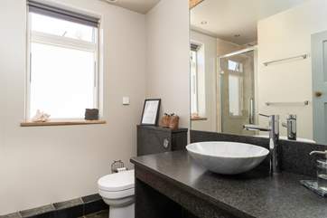 The ground floor shower-room with a waterfall shower.