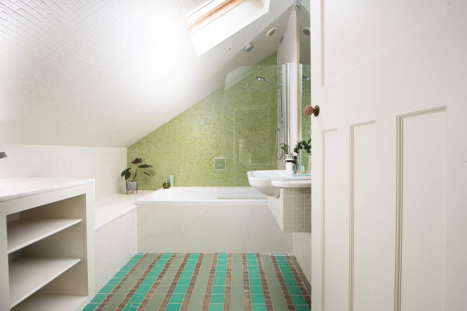 The quirky en suite in bedroom 3, a bath to relax in and an overhead rainfall shower.