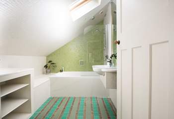 The quirky en suite in bedroom 3, a bath to relax in and an overhead rainfall shower.