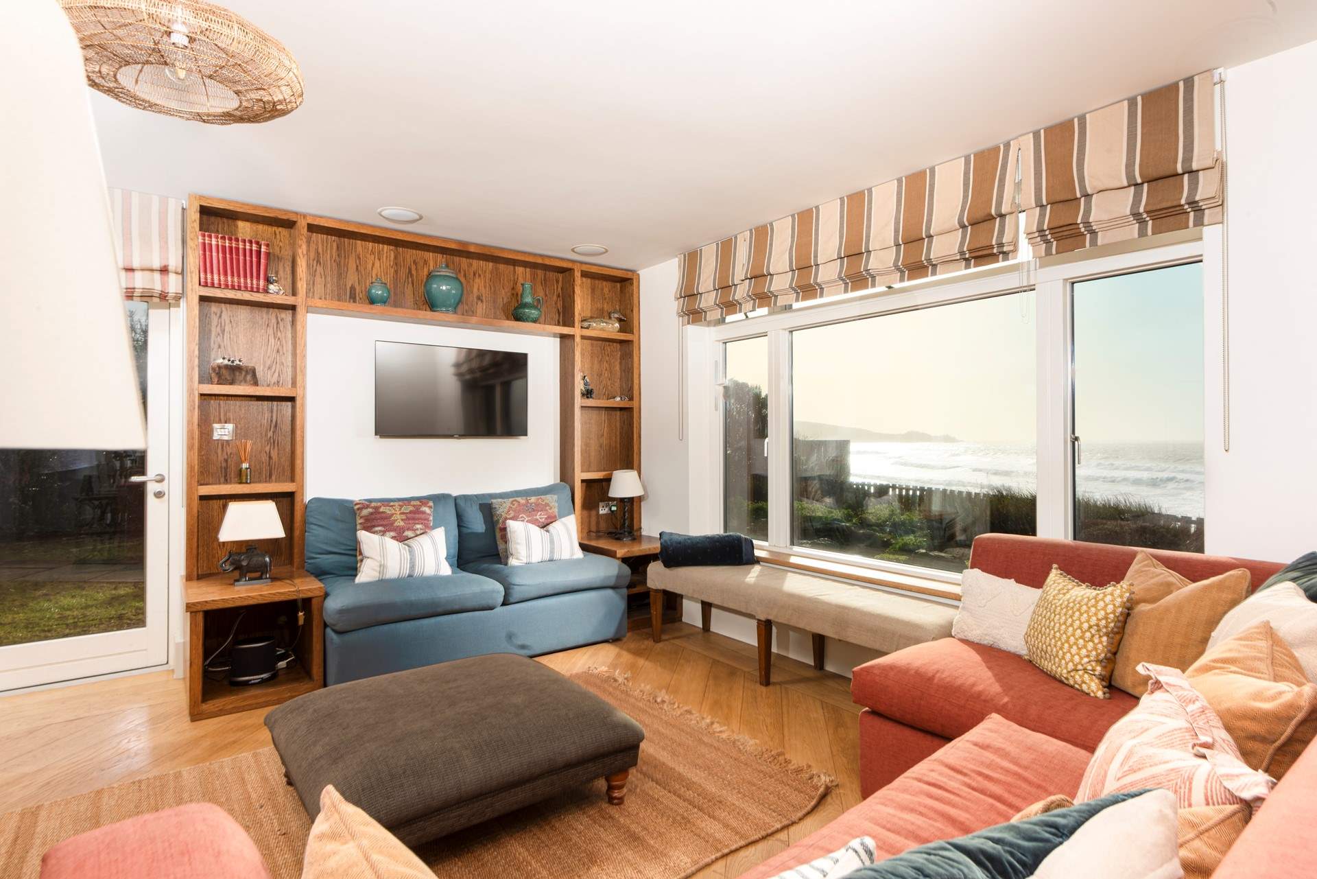 The huge windows framing the beautiful views beyond.