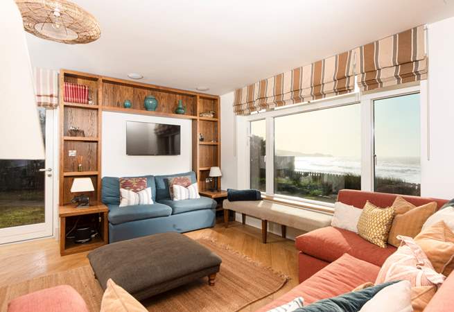 The huge windows framing the beautiful views beyond.