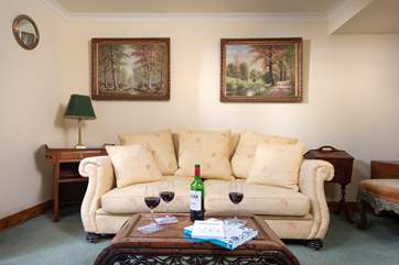 Enjoy a glass of wine in the traditionally styled sitting-room at the end of a busy day of exploring.