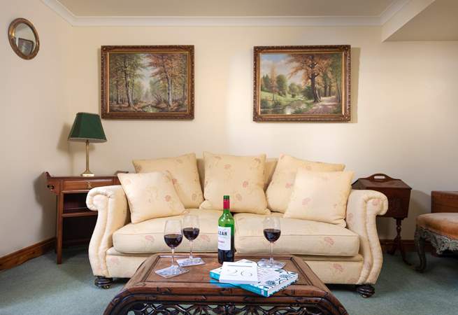 Enjoy a glass of wine in the traditionally styled sitting-room at the end of a busy day of exploring.  