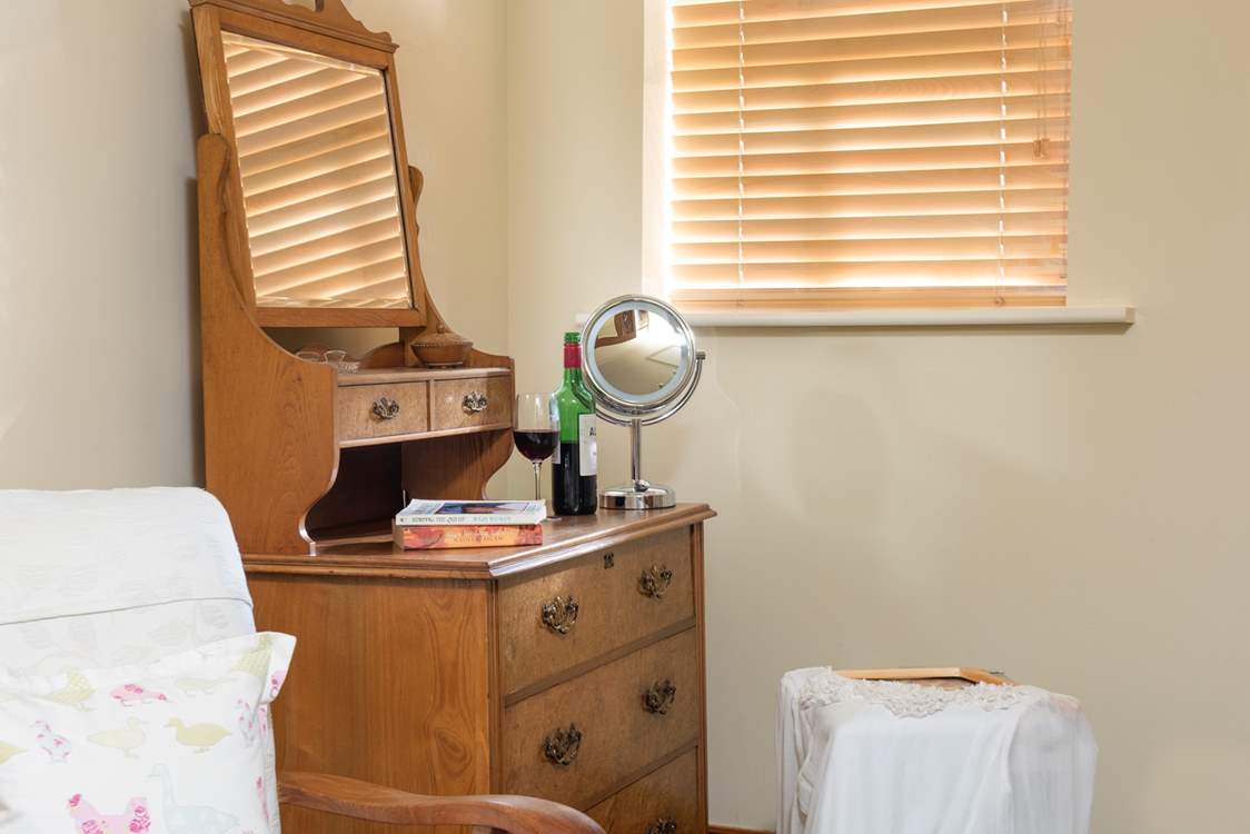 A little dressing-room with antique dressing-table.
