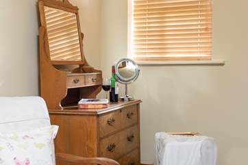 A little dressing-room with antique dressing-table.