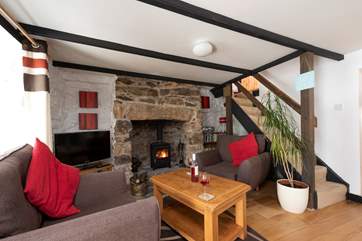 Traditional steep Cornish stairs (which are narrow at the top) lead up to the 2 bedrooms from the sitting-area.