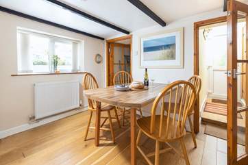 The dining room, take the door to the rear courtyard.