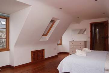 The spacious master bedroom has a 6ft king-size bed.