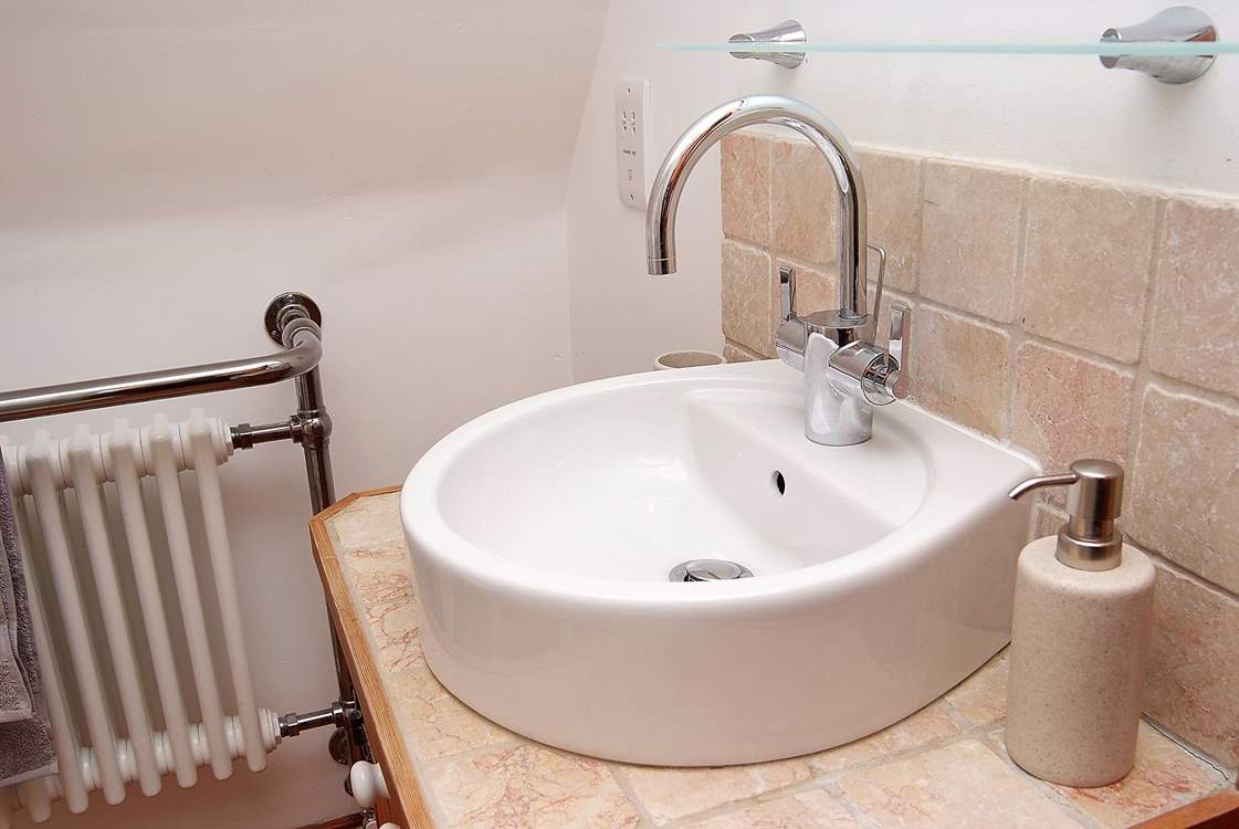 Modern fittings in the en suite shower-room.