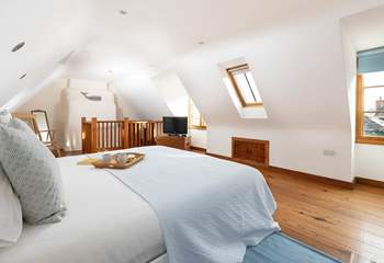 The spacious main bedroom has a 6ft king-size bed.